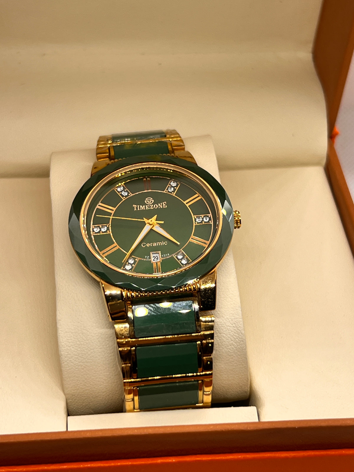 TMZ Ceramic Gold Roman Numeral Date Men's Watch